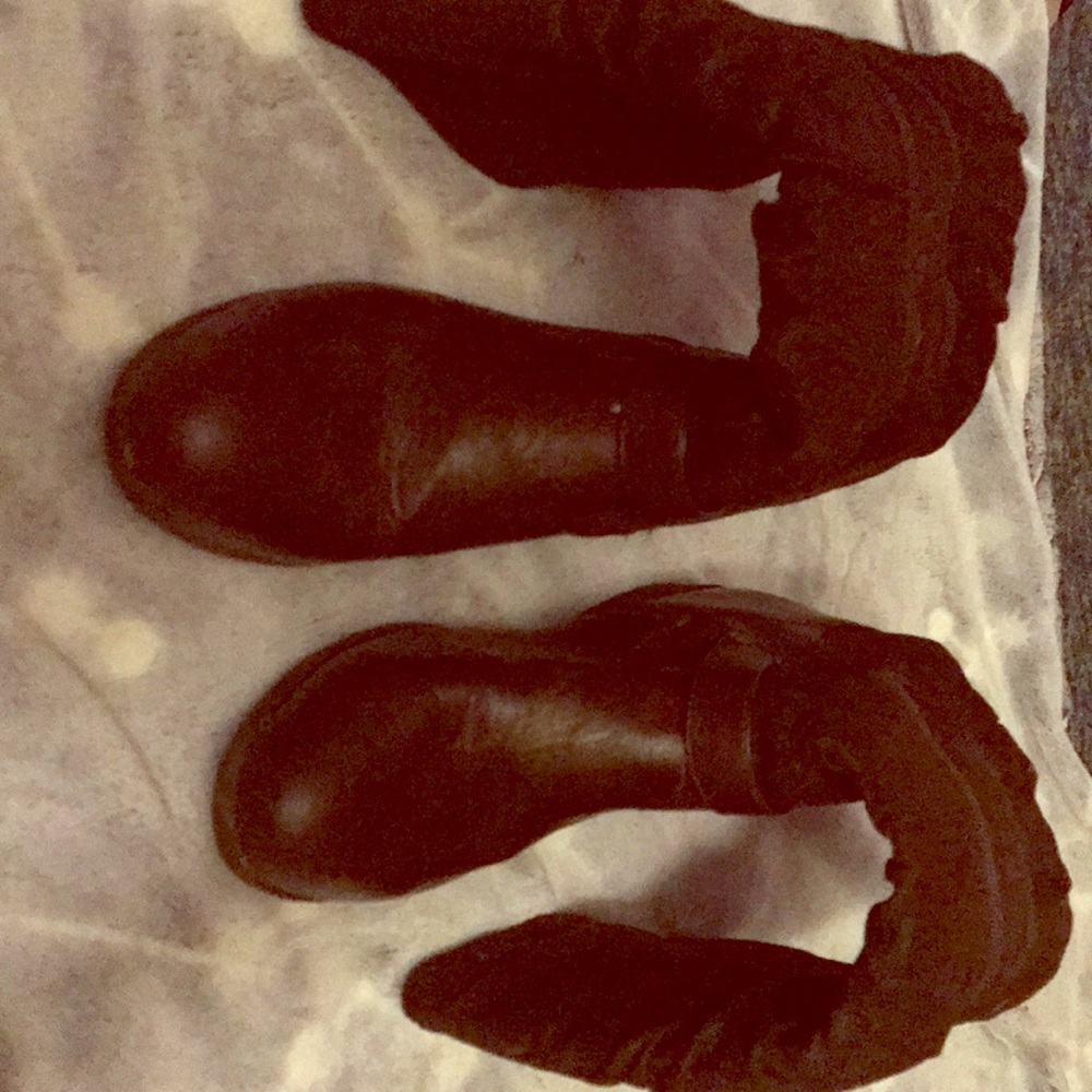 Dark brown boots (both boots)